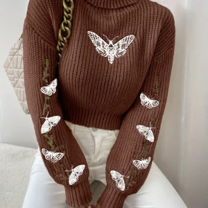 Alma - Pull à col roulé avec motif papillon