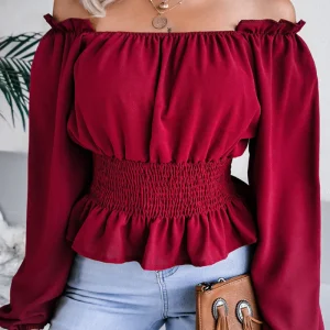 Landra - Élégante blouse à manches longues et épaules dénudées avec ourlet à volants