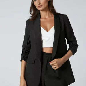 Blazer élégant avec manches à volants et col châle