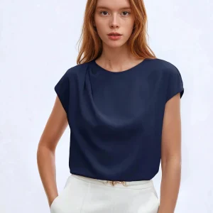 Haut à volants et col rond avec manches bouffantes pour le bureau