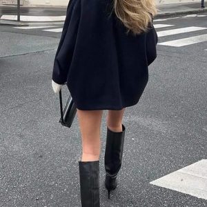 Veste en laine à épaules ouvertes, col montant et revers