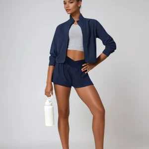 Short de course anti-transpiration, taille mi-haute, poches, séchage rapide