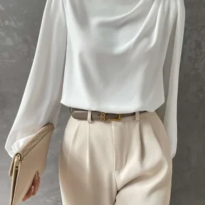 Haut drapé élégant à manches évêque