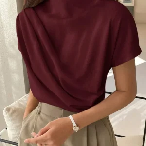 Chemisier décontracté chic à col cheminée de couleur unie