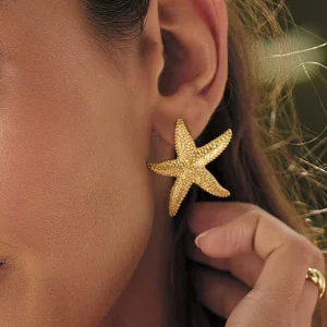 Boucles d'oreilles à tige en or avec étoile de mer